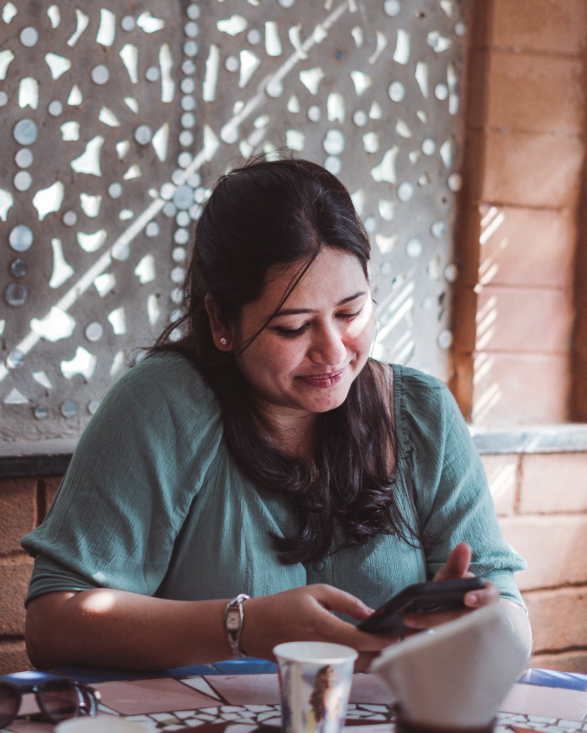 Woman entrepreneur using phone